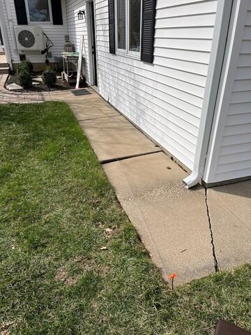 Cracked and Unleveled Sidewalk