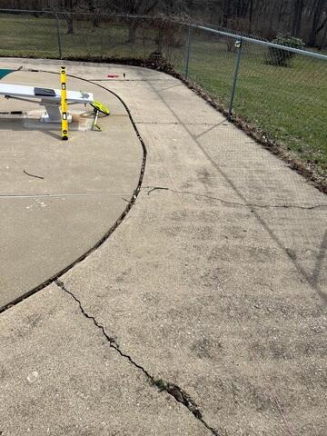 Cracked Concrete Surrounding Pool