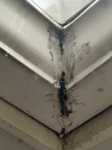 Water damaged gutter seam
