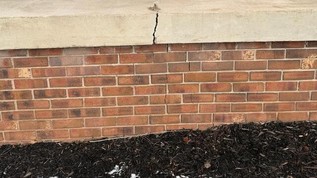 Foundation and Concrete Porch Crack Due to Settling