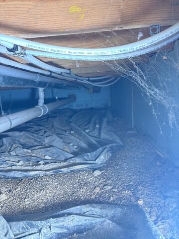 Crawl Space Before Insulation Upgrade