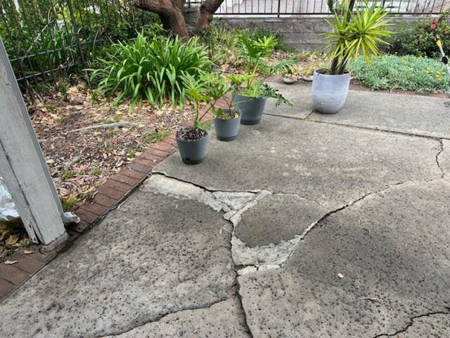 Cracked Patio Concrete Before Repair in Laguna Niguel