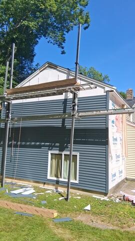 New Siding Starts To Take Shape