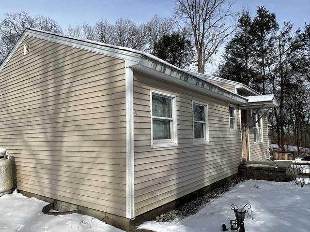 Before: Weathered Siding and Staining