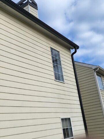 New black Gutter Shutter downspouts