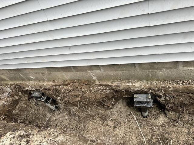 Foundation Lifted and Stabilized with Piers