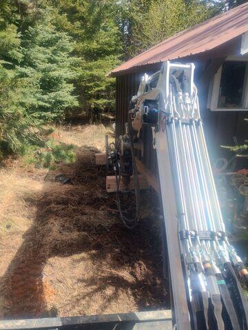 Installation of helical piers in progress