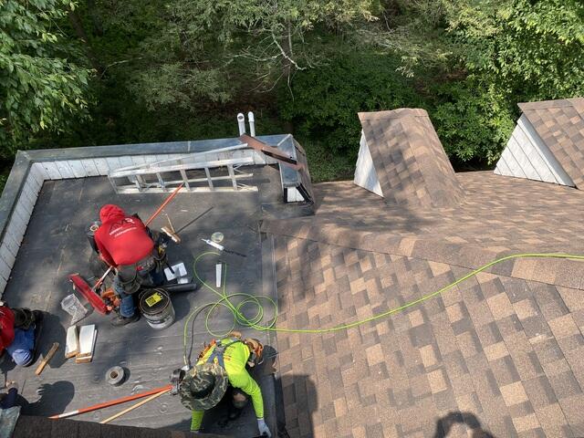 Detail Work Around Flat Roof Tie-Ins