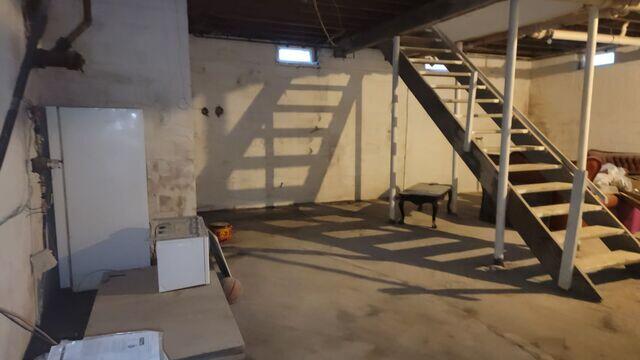 Photo 1: A Concrete Basement