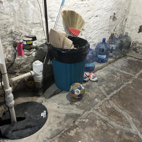 Cove Drainage Channel Around Basement