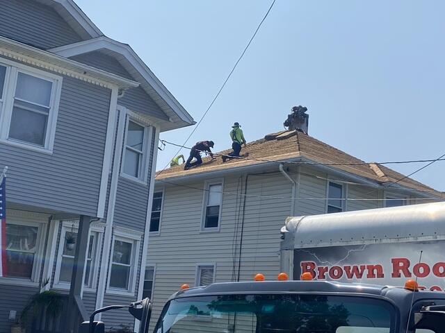 Brown Roofing Crew in Action