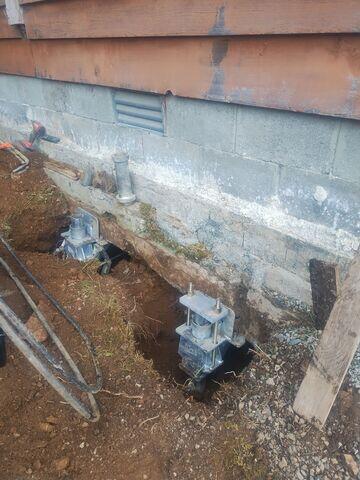 Push pier bracket installation in progress