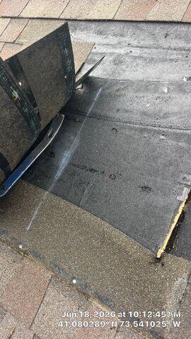 Shingles have detatched from underlayment.