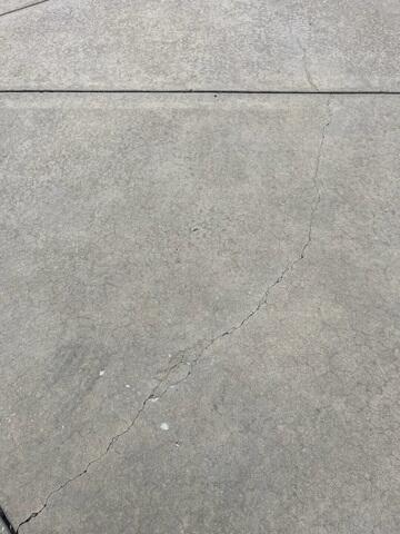 Large Cracks In Concrete