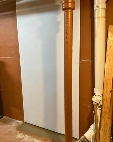 Plugged and Patched Basement Wall