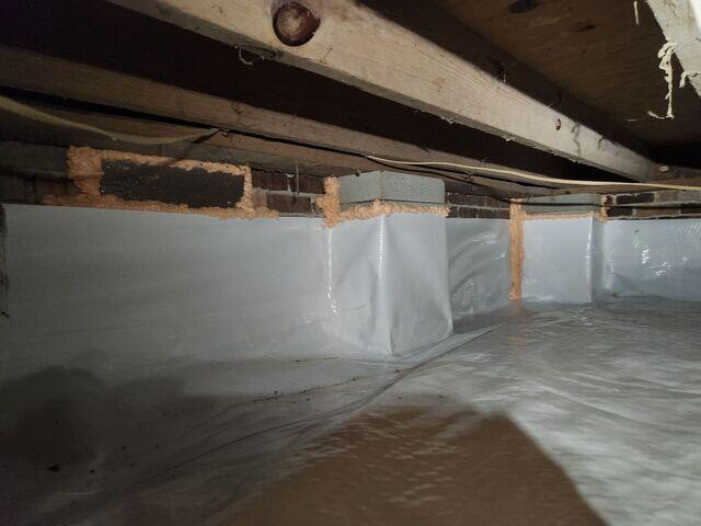 The CleanSpace Liner is attached to the walls of the crawl space to allow condensation to drip down under the liner