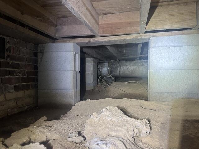 A dirty, damp, and drafty crawl space that needed some work!