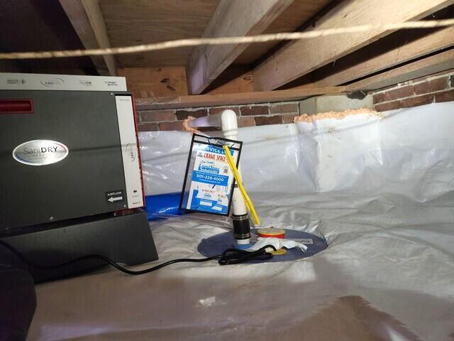 The SaniDry Sedona Dehumidifier drains right into the SuperSump Sump Pump