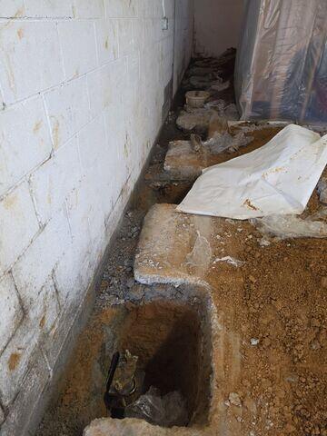 Push Pier Installation Beneath the Foundation