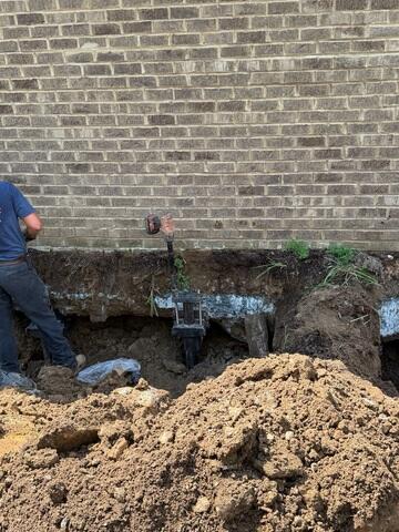 Installing Helical Piers for Foundation Support
