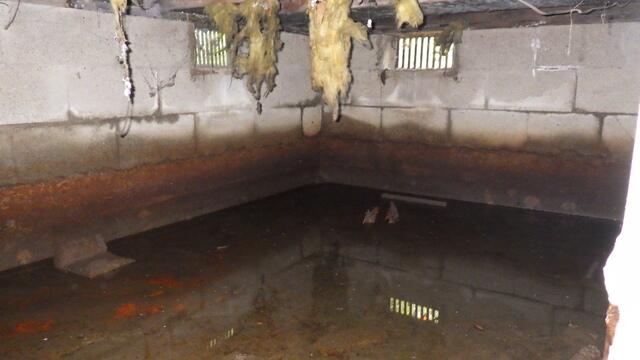 Flooded Crawl Space Before Repairs