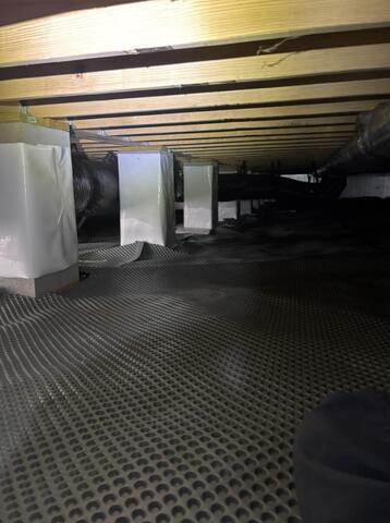 Drainage matting and wrapped piers