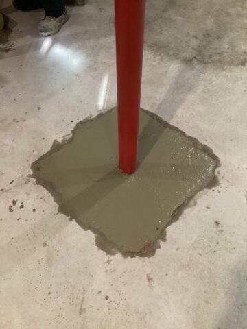 Lally Column Cemented into Foundation Floor