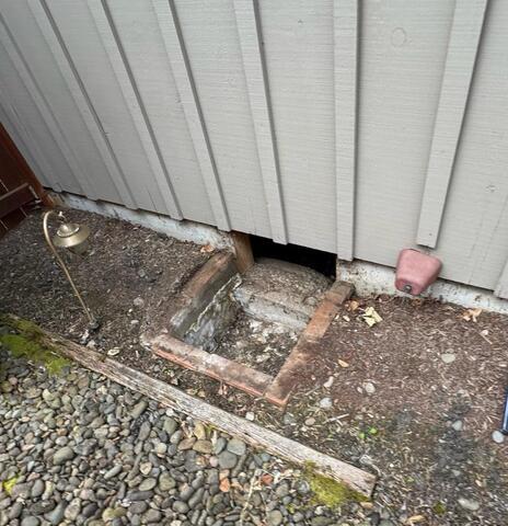 Wide Open Crawl Space Entrance