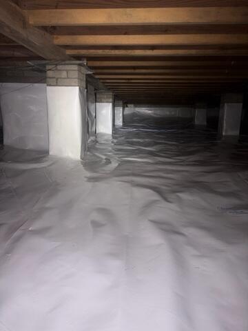 Brick is porous, so we wrap brick piers to prevent condensation