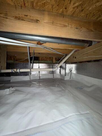 Sealing the Crawl Space to Lock Out Moisture