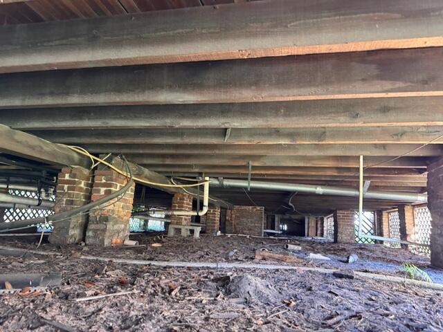 Signs of Crawl Space Settlement Beneath the Home