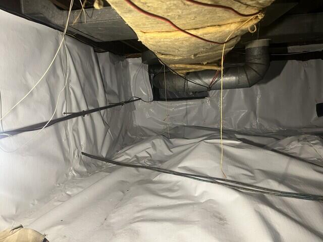 Heavy duty vapor barrier sealed in crawl space