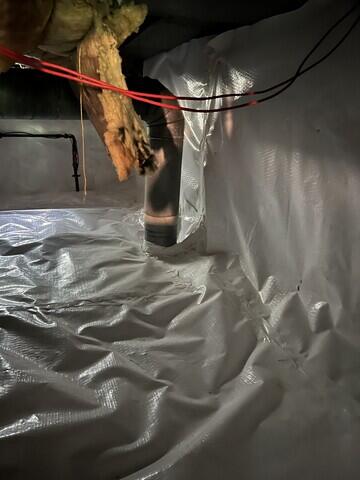 Vapor barrier cut in around HVAC line