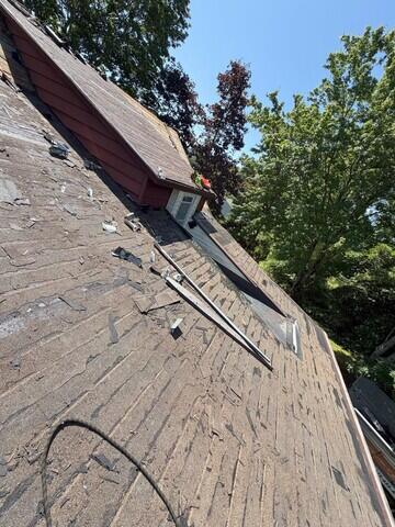 After removal of existing layers of shinge