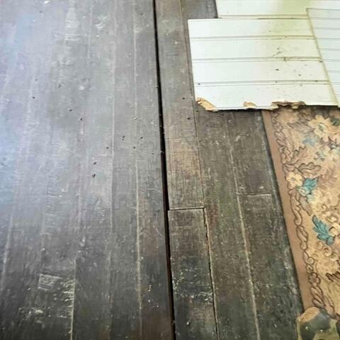 When we arrived during the inspection, the hardwood floors were uneven and gapping, creating tripping hazards and the opportunity for debris to fall in between.