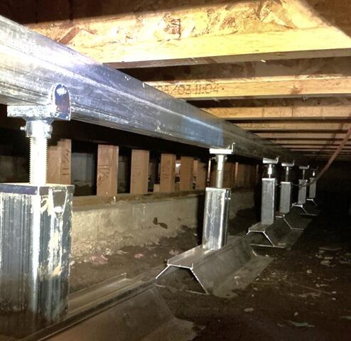 Steel SmartJack Posts Beneath New Steel Beam