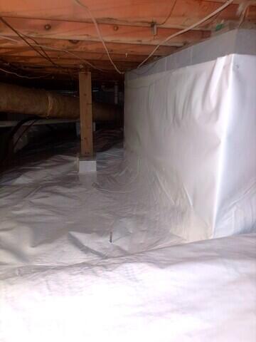 We eliminate a source moisture by wrapping concrete blocks with Wallie
