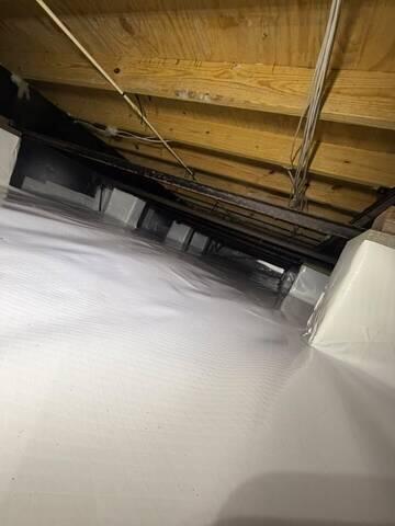Crawl Space Encapsulation Blocks Ground Moisture
