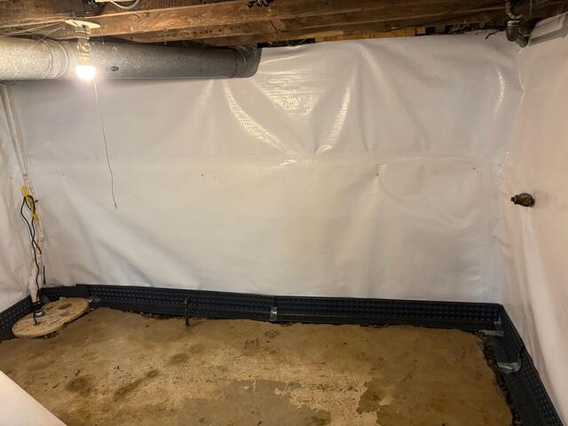 Installing the Drainage System & Sump Pump