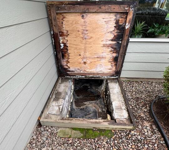 Damaged Crawl Space Entry