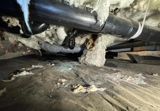 Fallen Fiberglass Insulation