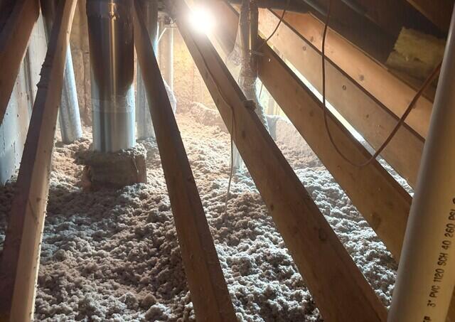 Blown-In Insulation Installed in Attic