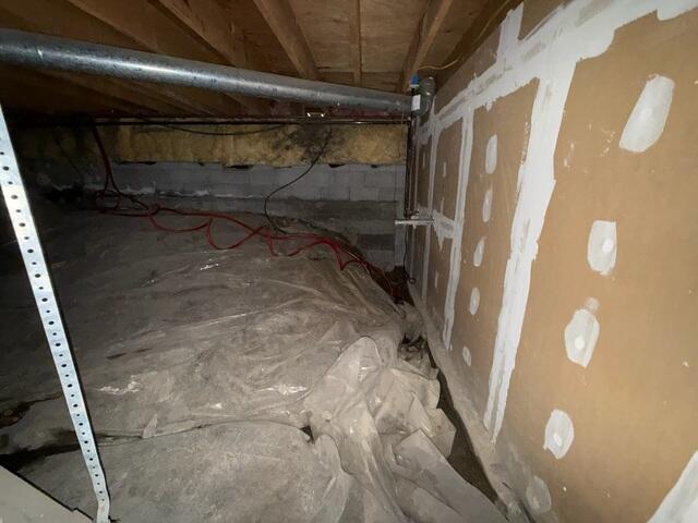 Dirty, damp crawl space