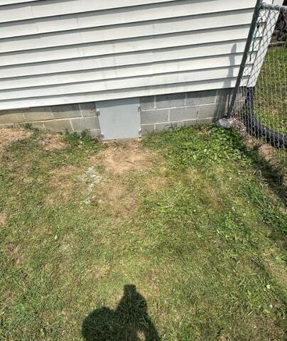 Crawl space entry door
