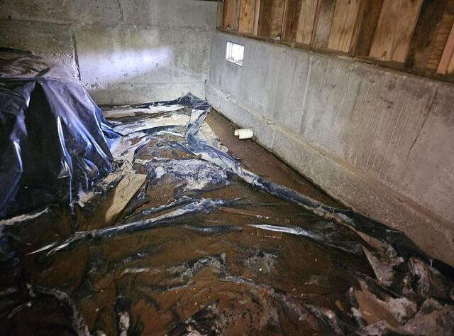 Torn Vapor Barrier