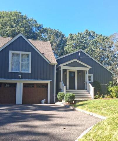 Thorough surface cleaning and prep work on siding and trim before the final coat of exterior pain