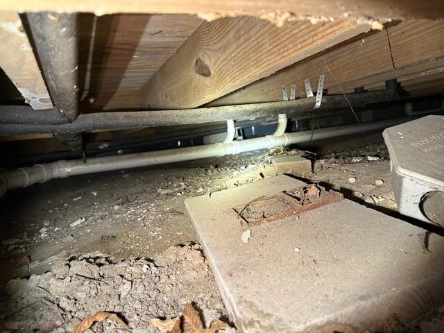 Exposed Dirt Crawlspace