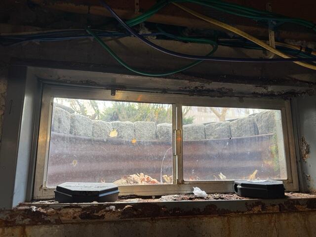 Rusted Old Basement Window