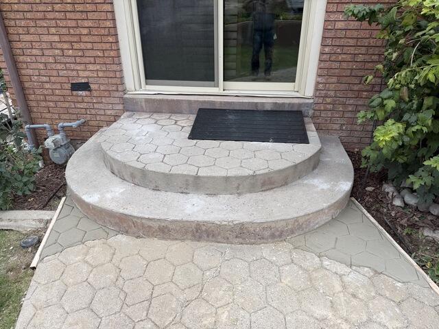 Hydraulic Jack Lifting Settled Concrete