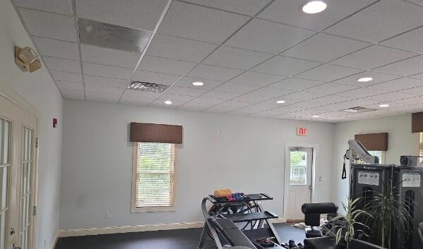 Before: Scuffed, neutral walls in need of a complete color update.